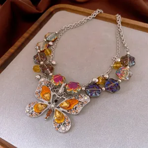 Vintage butterfly pendant necklace with yellow crystals and double layered beaded chains