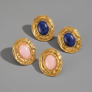 Close-up of gold wavy bezel stud earrings with blue and pink lapis lazuli stones
