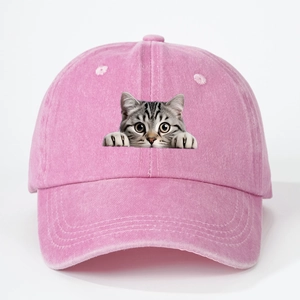 Close-up of pink washed cotton baseball cap with realistic tabby cat graphic and fine stitching