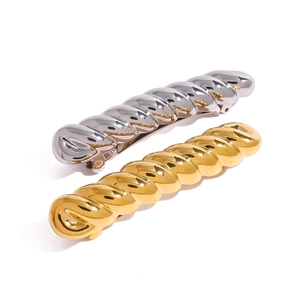 Minimalistische spiraalvormige haarspelden in goud en zilver met een hoogglans afwerking