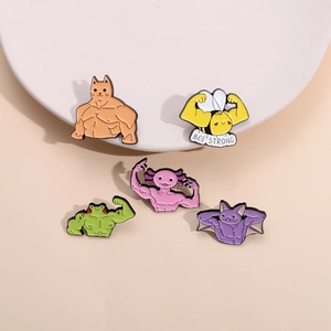 Funny cartoon animal muscle enamel pins set featuring cat, frog and bee on a white display