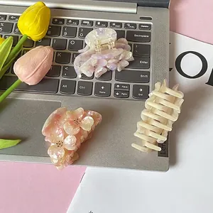 Elegant floral acetate hair clips set with shimmering pearlescent finish for women
