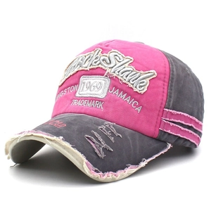 Pink and grey distressed vintage baseball cap with 1969 embroidery and frayed edges