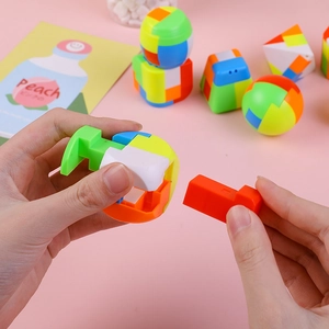 Luminous hand-assembled spherical puzzle toy for children showing assembly process