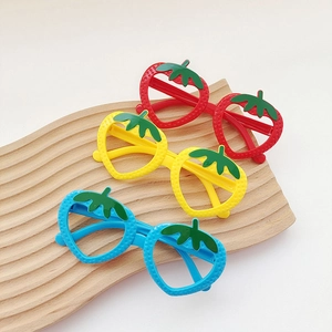 Set of three colorful strawberry-shaped children's decorative eyeglass frames without lenses