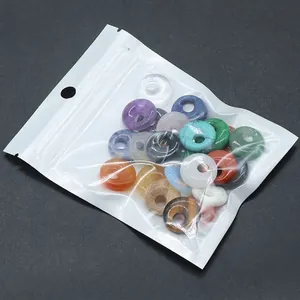 Natural crystal stone donut charms in mixed colors with OPP bag packaging