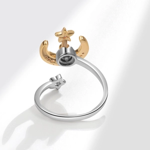 Star and moon spinning adjustable open ring with sparkling cubic zirconia accents