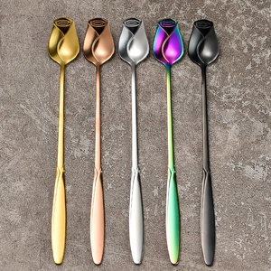 Five pieces of rosebud shaped stainless steel coffee spoons in various metallic finishes