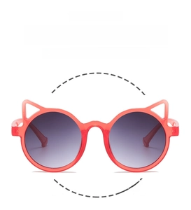 Detail of red cat ear sunglasses for kids with lightweight flexible frames and purple lenses