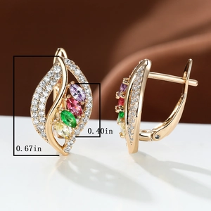 Detailed view of champagne gold leaf earrings with colorful marquise zircons and size labels
