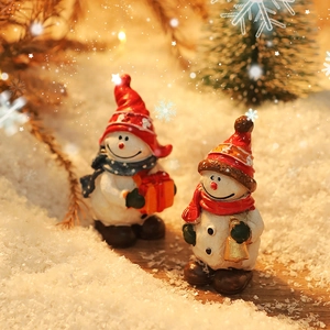 Mini Christmas snowman figurines with red hats and festive gifts for winter tabletop decor