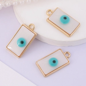 Rectangular white Evil Eye charms with gold plating for DIY jewelry and necklaces