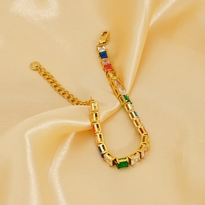 Detailed shot of gold stainless steel bracelet with colorful rectangular zircon stones