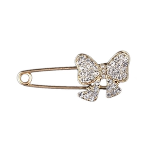Elegant gold bow brooch pin with sparkling rhinestones for women clothing accessory