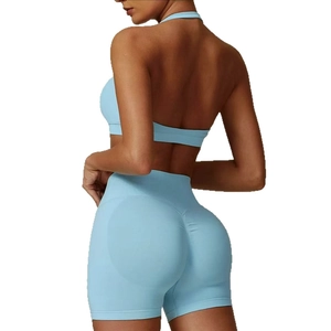 Light blue halter yoga set featuring seamless high waist sports bra and lifting shorts