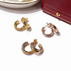 Three-ring interlocking earrings in gold, silver, and rose gold stainless steel design