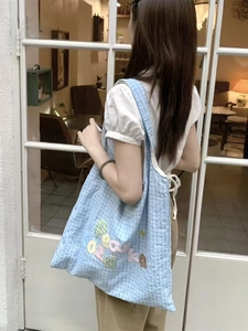 Light blue plaid shoulder bag with colorful Peach letter embroidery and large capacity