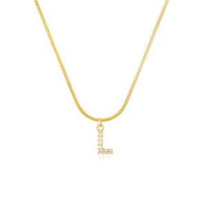 Macro detail of gold snake chain necklace with sparkling diamond-set letter L pendant