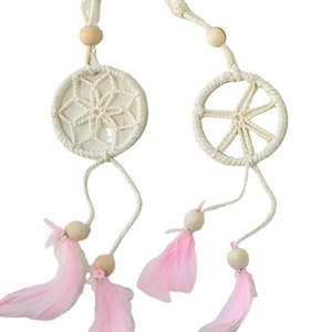 Bohemian dream catcher wall decor with cream woven rope, wood beads and pink feathers