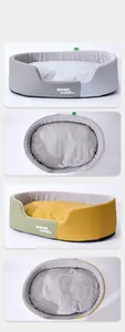 Detail view of oval thickened pet bed with Good Luck print in gray and green colors