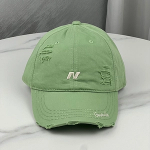Distressed mint green baseball cap with letter N embroidery and wide brim