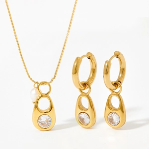 Gold stainless steel jewelry set with teardrop pendant, zircon stone and pearl accent