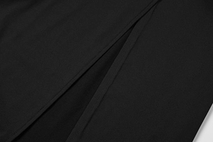 Detailed close-up of the high-quality stitching and side slit on this black midi dress