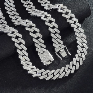 Detailed close-up of 20mm triple-row pave Cuban link chain with shimmering crystals