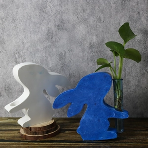 Detail of bunny hydroponic vase mold showing dual rabbit designs and glass test tube