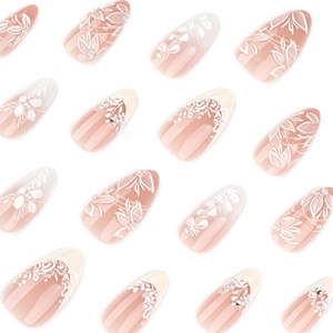 3D white floral almond press-on nails with pearls and rhinestones on pink gradient base