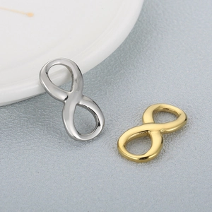 Polished stainless steel infinity charms in silver and gold finish for jewelry making