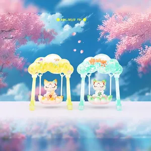 Nine-tailed fox resin figures with Fu and Fa signs on lotus swings in a peach garden