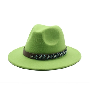 Close-up of apple green wool fedora hat featuring a brown leather band and ethnic beads