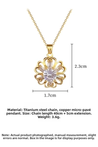 Detailed macro view of a hollow flower pendant with sparkling cubic zirconia on chain
