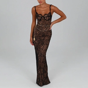 Detailed close-up of black lace midi dress with golden heart charm chain belt detail