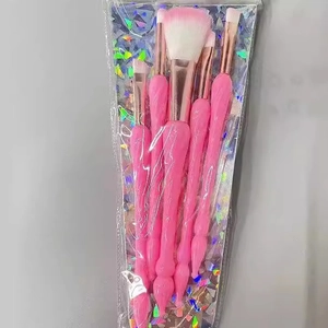 Five-piece pink unicorn makeup brush set with rose gold ferrules and soft gradient bristles