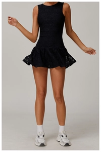 Close-up of intricate lace texture and A-line silhouette of this black sleeveless dress