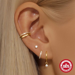 925 sterling silver gold U-shaped earring set with sparkling cubic zirconia on model