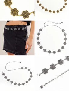 Detail of flower metal chain belt with lobster clasp and adjustable length in gold and silver