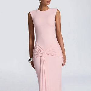 Detail of the elegant waist knot and ruched design on this light pink sleeveless maxi dress