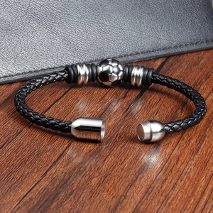 Men's black braided leather bracelet featuring silver soccer beads and a magnetic clasp