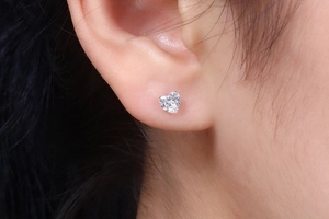 Close-up of heart-shaped cubic zirconia stud earrings in S925 sterling silver