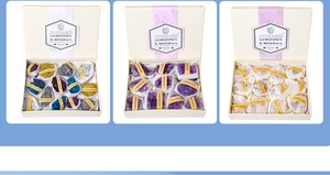 Three natural crystal gift sets featuring silicon carbide, amethyst and rose quartz stones