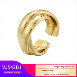 Macro detail of gold-plated brass double-layer twisted open ring with 23mm width