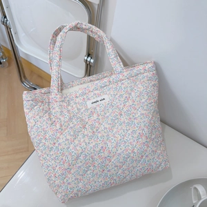 Floral quilted cotton handbag with simple wish label in a French country style