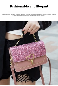 Detail of pink glitter flap bag featuring a golden heart lock and metallic handle