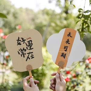 Creative Chinese calligraphy fans with inspirational text for summer in a garden setting