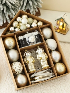 Champagne gold and silver Christmas ornament set with unique astronaut and camera shapes