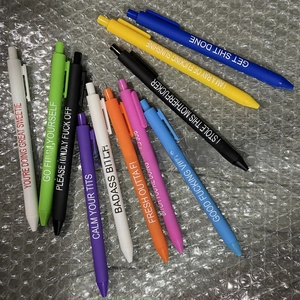 Detailed view of colorful novelty pens featuring humorous motivational slogans on bubbly film