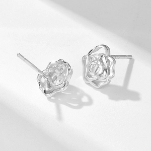 Detail of S925 sterling silver rose stud earring with hollow petals and zircon center